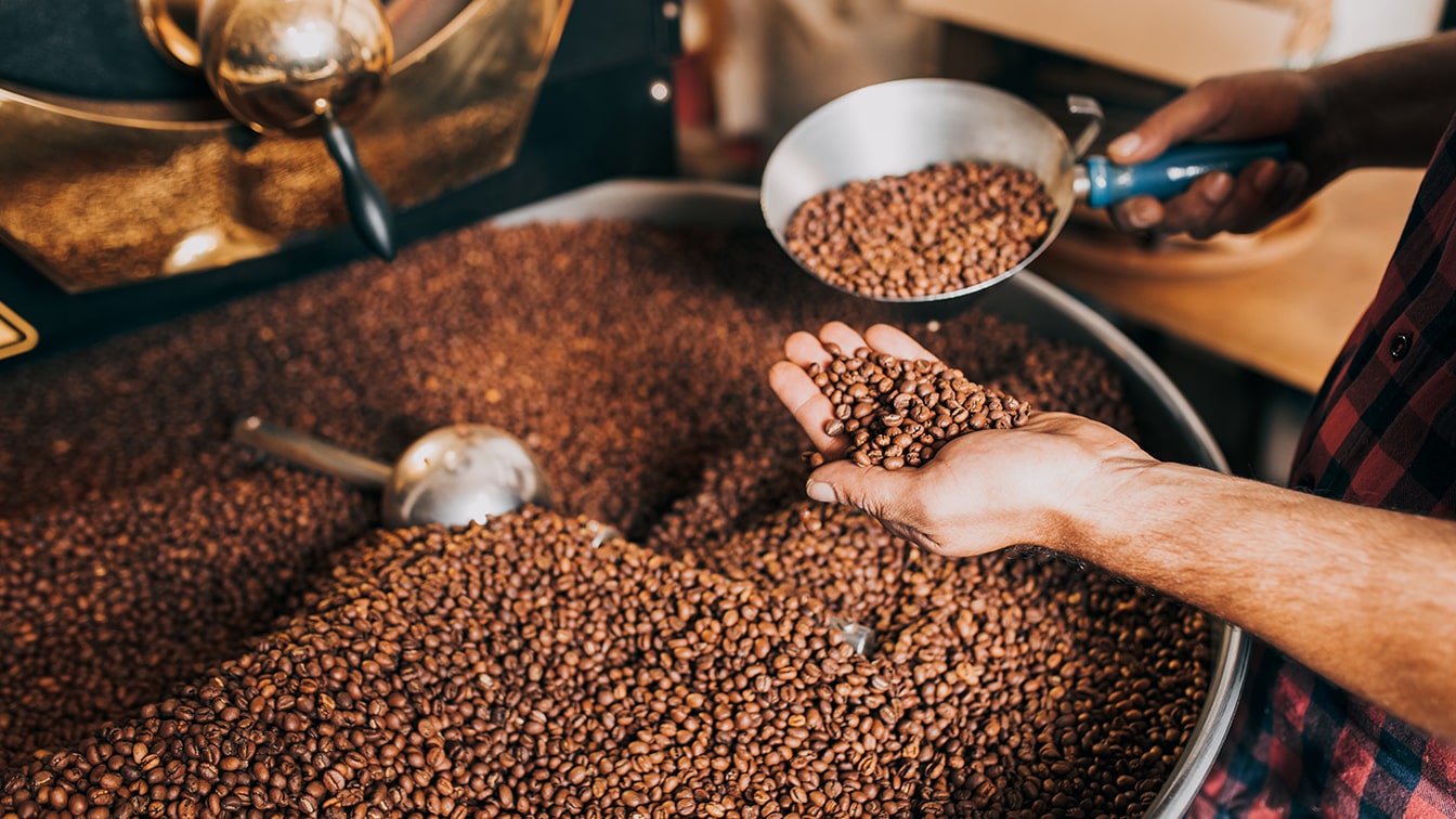 Roasted Coffee Beans in a Large Roasting Machine