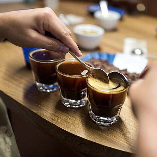 Coffee Cupping Techniques — Removing Crust Over Coffee