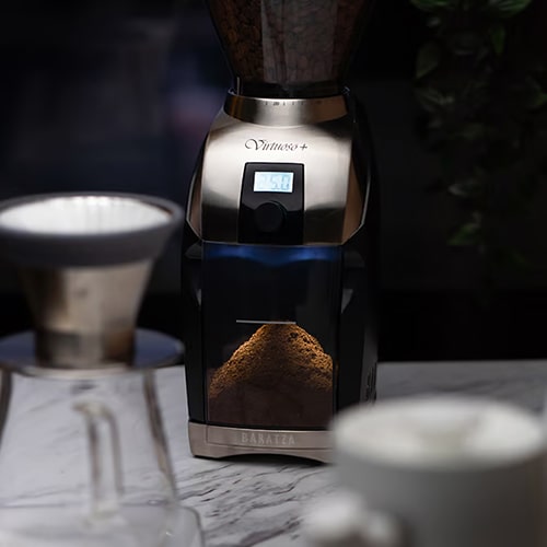 Ground Coffee in Baratza Virtuoso+ Conical Burr Coffee Grinder Bin Ground Coffee in the Bin of Baratza Virtuoso+ Conical Burr Coffee Grinder